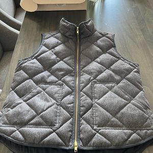 J.Crew slate gray quilted zip up vest. Large pockets.  Gold zipper.